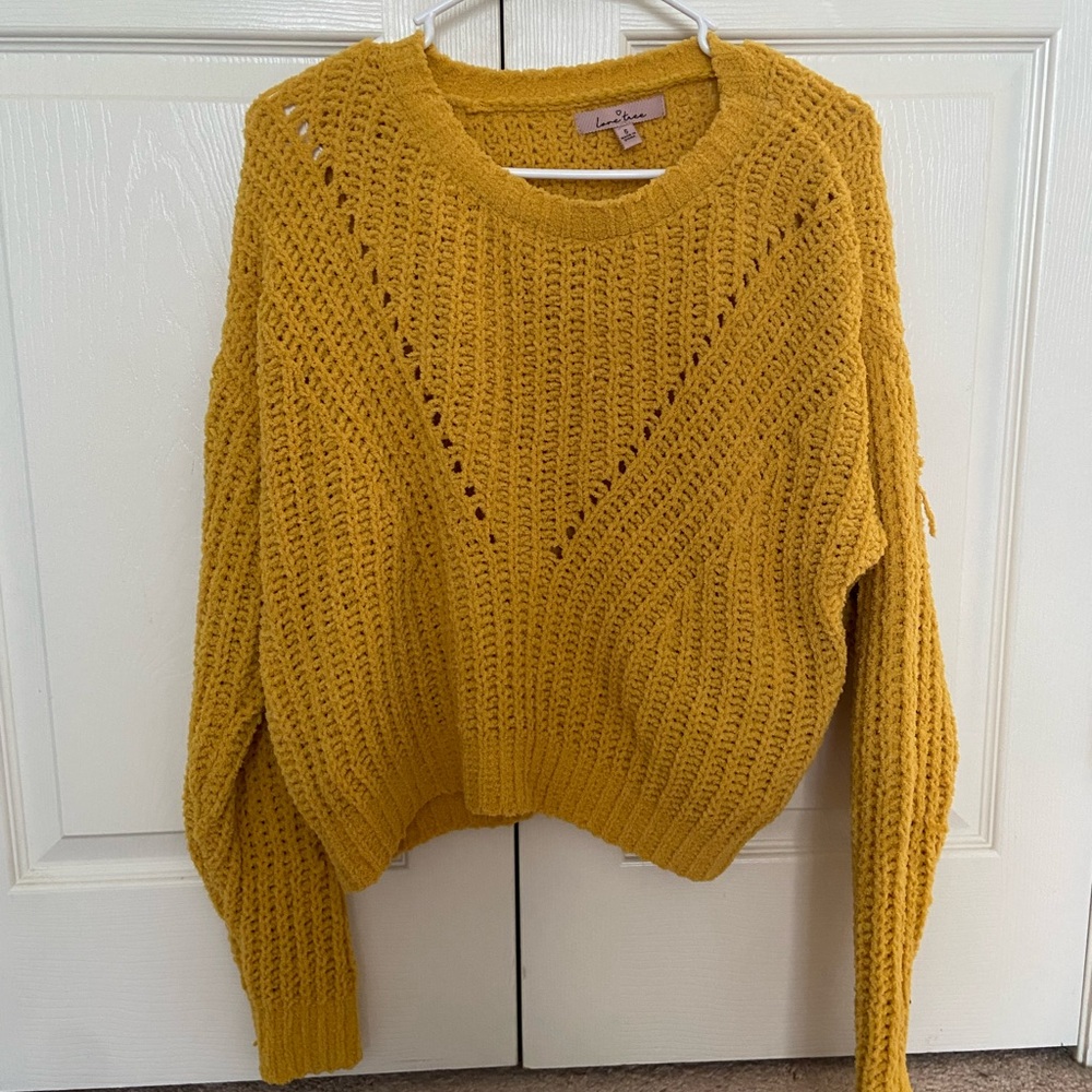 golden yellow sweater